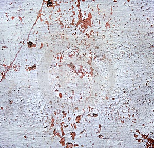 Grunge texture . Red stains , scratches and dots on white background . Wall surface
