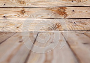 Grunge vintage wooden board table in front of old wooden background