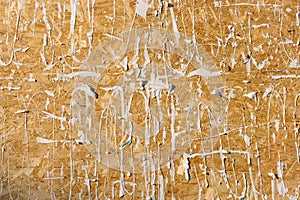 Grunge wooden wall texture with old ripped torn paper posters background