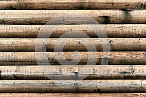Grungy background of cylindrical logs