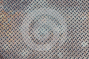 Grungy Industrial Checker Plate Background Texture with Rusty Wo photo