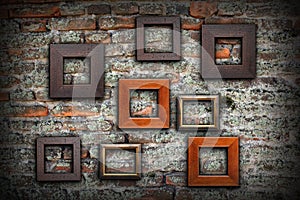 Grungy old wall full of wooden frames