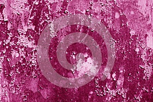 Grungy rusted metal wall surface in pink tone