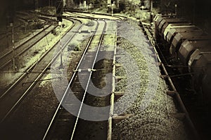 Grungy sepia shot of train filled with gravel