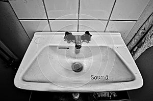 Grungy sink in black and white