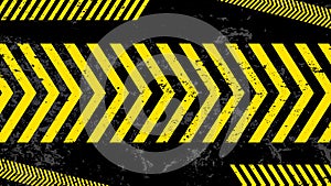 A grungy and worn hazard stripes texture. Abstract warning striped rectangular background, yellow and black stripes on the diagona