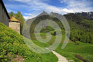 Gruyere Castle,footpath and Alps Mountains, Gruyeres, Switzerlan