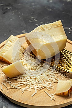 Gruyere Cheese hard yellow cheese. good melting cheese, particularly suited for fondues. Food recipe background. Close up