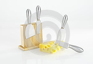 Gruyere cheese slice with cheese cutters, knifes and forks isolated on white