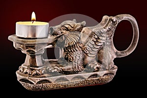 Gryphon candle holder with candle photo