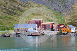 Grytviken abandoned whaling station in South Georgia. Lost places with rusty tanks old boats, Antarctica.