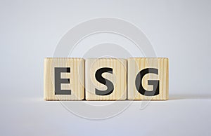 GSG - Environmental, Social and Governance symbol. Concept word GSG on wooden cubes. Beautiful white background. Business and GSG