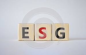 GSG - Environmental, Social and Governance symbol. Concept word GSG on wooden cubes. Beautiful white background. Business and GSG