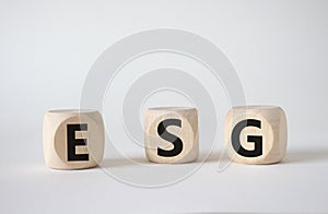 GSG - Environmental, Social and Governance symbol. Concept word GSG on wooden cubes. Beautiful white background. Business and GSG