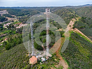 GSM, 4G, 5G and radio telecommunication towers on the top of a mountain. Cell phone tower and transceiver