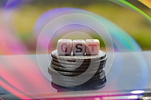 gst and coins top view