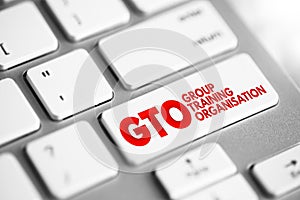 GTO - Group Training Organisation acronym text button on keyboard, concept background