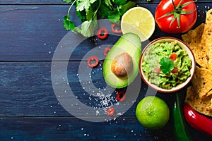 Guacamole bowl with ingredients photo