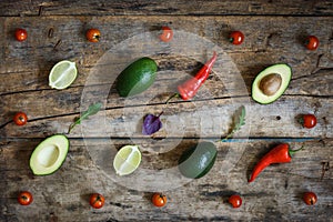 Guacamole ingredients flat lay on the wooden table