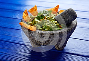 Guacamole with nachos in Mexican molcajete