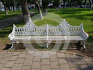A bench in the Tulipan public park in Guadalajara photo