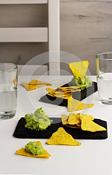 Guakamole sauce and nachos. Traditional mexican cuisine photo