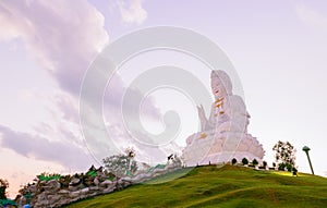 Guan Yin Statue on evening sky at Wat huay pla kang temple