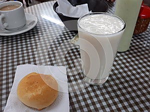 Guanavana fruit juice with pan de bono photo