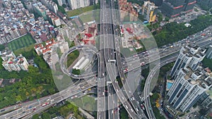 Guangzhou city and complex road interchange. Guangdong, China. Aerial view