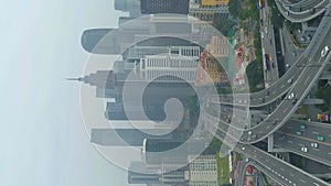 Guangzhou City and Complex Road Overpass. Guangdong, China. Aerial View. Vertical Video