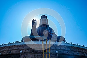 Guanyin buddha or `Goddess of Mercy ` statue on top of Xiqiao mountain