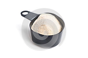 Guar gum, also called guaran, is a galactomannan polysaccharide extracted from guar beans. On white background photo