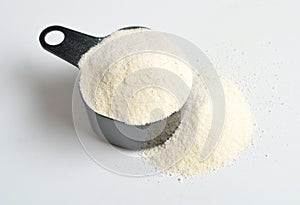 Guar gum, also called guaran, is a galactomannan polysaccharide extracted from guar beans. On white background photo