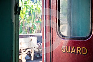 `Guard` door compartment of a train sitting idle in Kandy station, Sri Lanka.