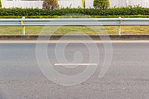 The guard rail, barrier on wayside with cloudy and hill. the straight line from highway fence. image from background, highway fenc