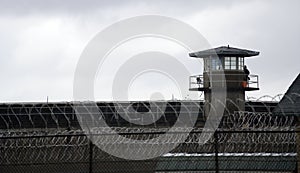 Guard Station State Penitentiary Barbed Wire Grey Sky Fence