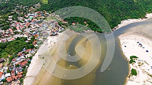 Guarda do Embau Beach located in the state of Santa Catarina near Florianopolis. Aerial image of beach in Brazil. Vertical video.