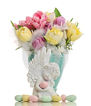 Guardian angel with easter eggs and flowers