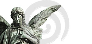Guardian angel sculpture with open long wings desaturated isolated on wide panorama banner background empty text space. photo