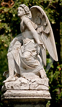 Guardian Angel statue in a cemetery outdoor