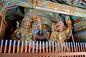 Guardian Demons at the Gates of Buddhist teple photo