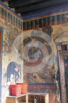 Guardian Lord deity fresco outside temple
