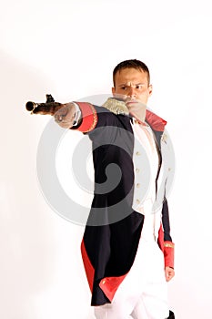 Guardsman in full-dress uniform aiming gun