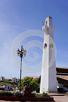 Guatavita, Colombia; January 05 2020: The town of Guatavita, place for the legend of El Dorado and people visiting the tower and t