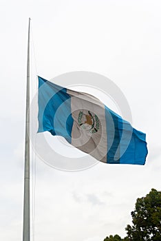 Guatemala, flag half flagpole, funeral, mourning, pain, Chapines centro america.