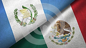 Guatemala and Mexico two flags textile cloth, fabric texture photo