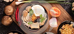 Guay Jap, meatballs, Vietnamese Pork Sausage and a fried egg, Thai food photo