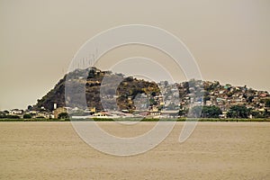 Guayas River and Hill with Houses View in Guayaquil Ecuadror photo