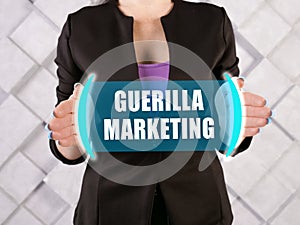 GUERILLA MARKETING text in virtual screen photo