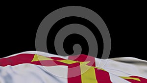 Guernsey fabric flag waving on the wind loop. Gernian embroidery stiched cloth banner swaying on the breeze. Half-filled black